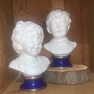 Pair of White Porcelain Child Busts on Cobalt Blue Bases Stamped JAPAN